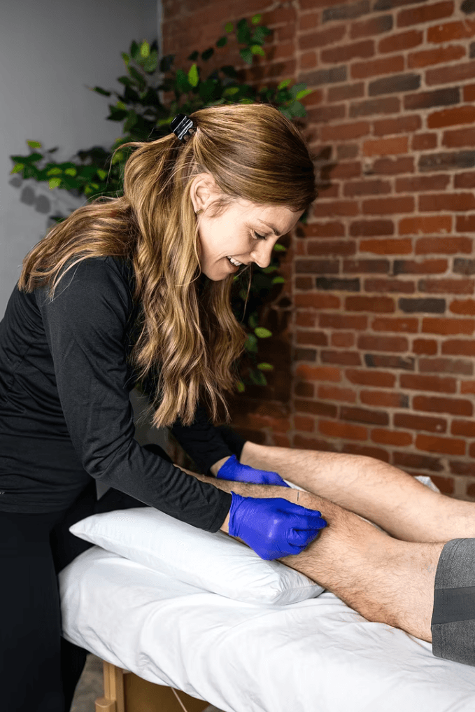 Dr. Molly performing Dry Needling