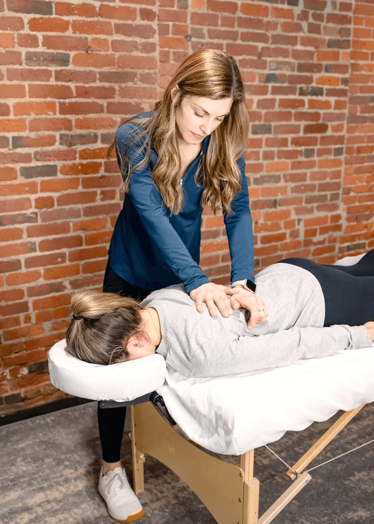 Dr. Molly performing Manual Therapy